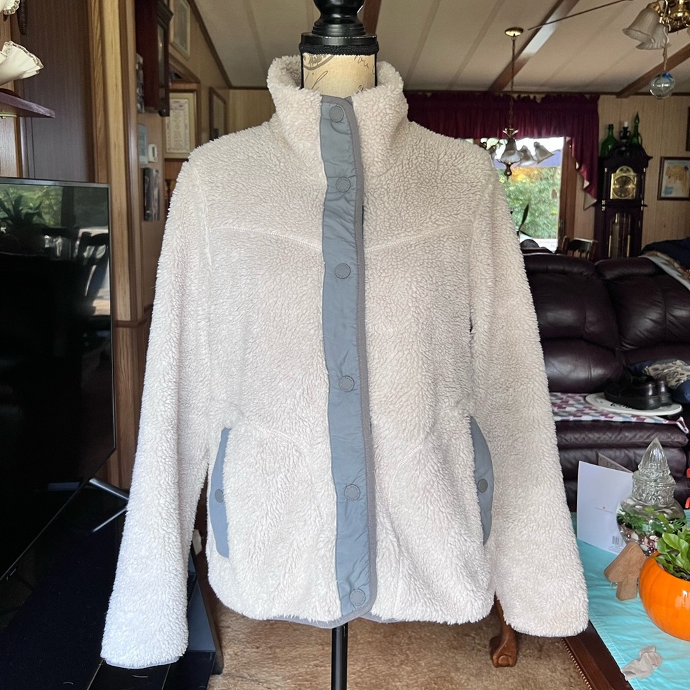 Women's L.L.Bean Sherpa Fleece Jacket with a high collar and snap-button closure